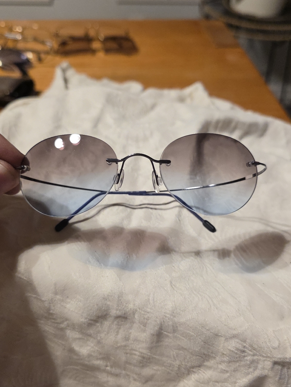 Rimless Oval Sunglasses with Blue Gradient Lenses